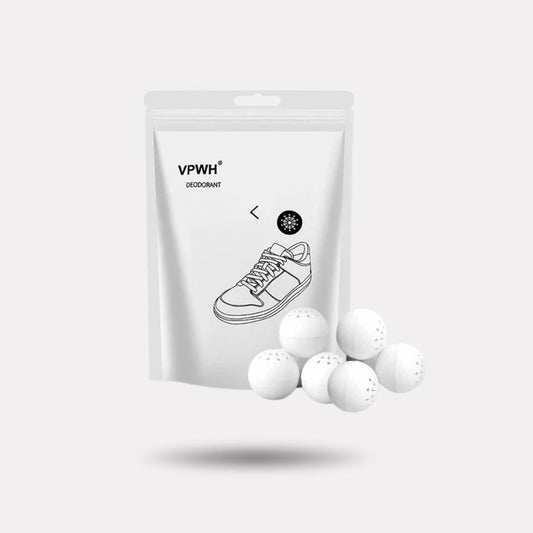 Pair of shoe deodorizer balls dropped inside shoes to absorb odor between wears