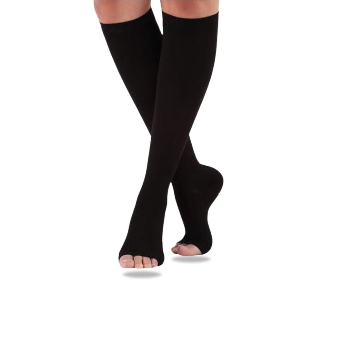 Knee-high compression stockings in nude and black, ending just below the knee