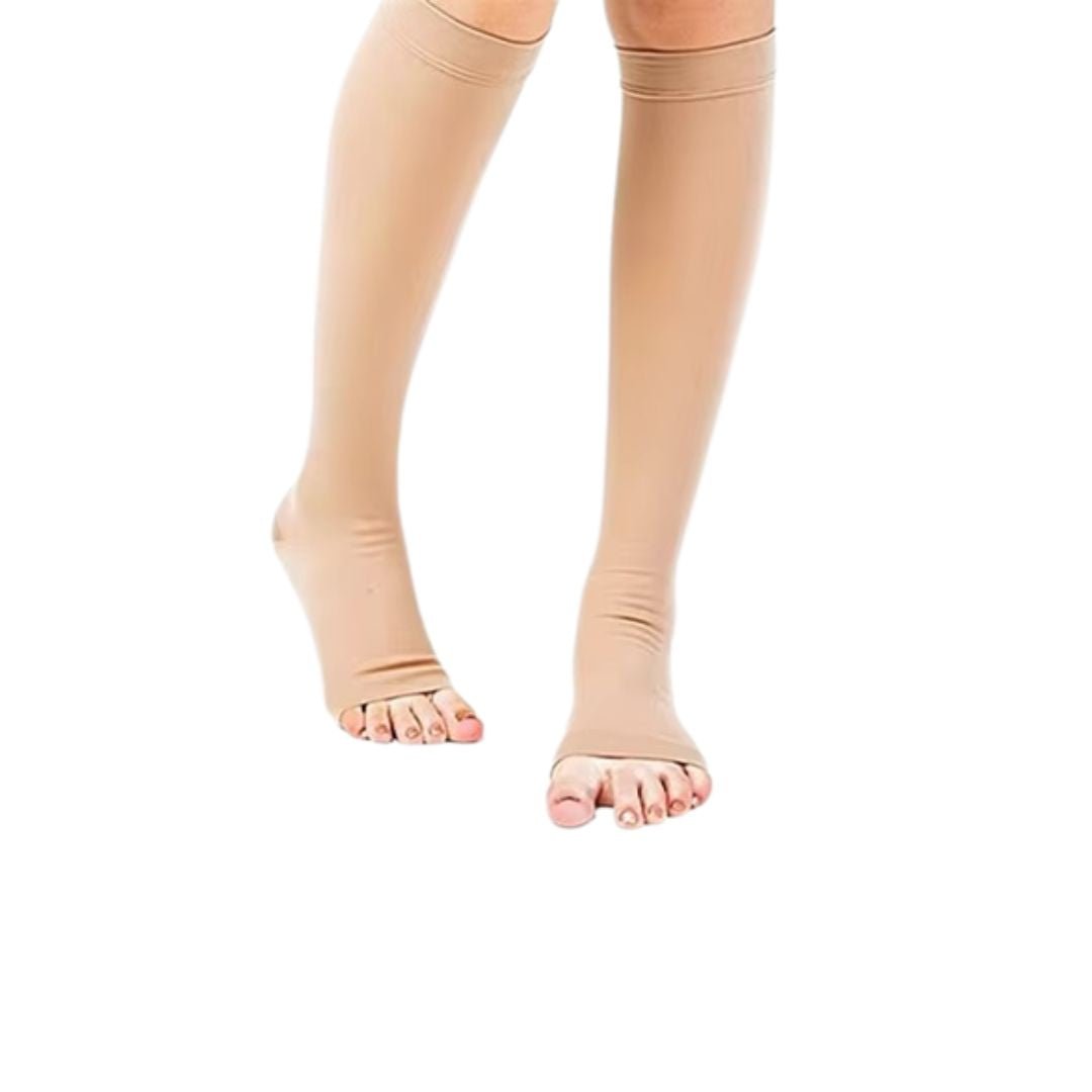Knee-high compression stockings in nude and black, ending just below the knee