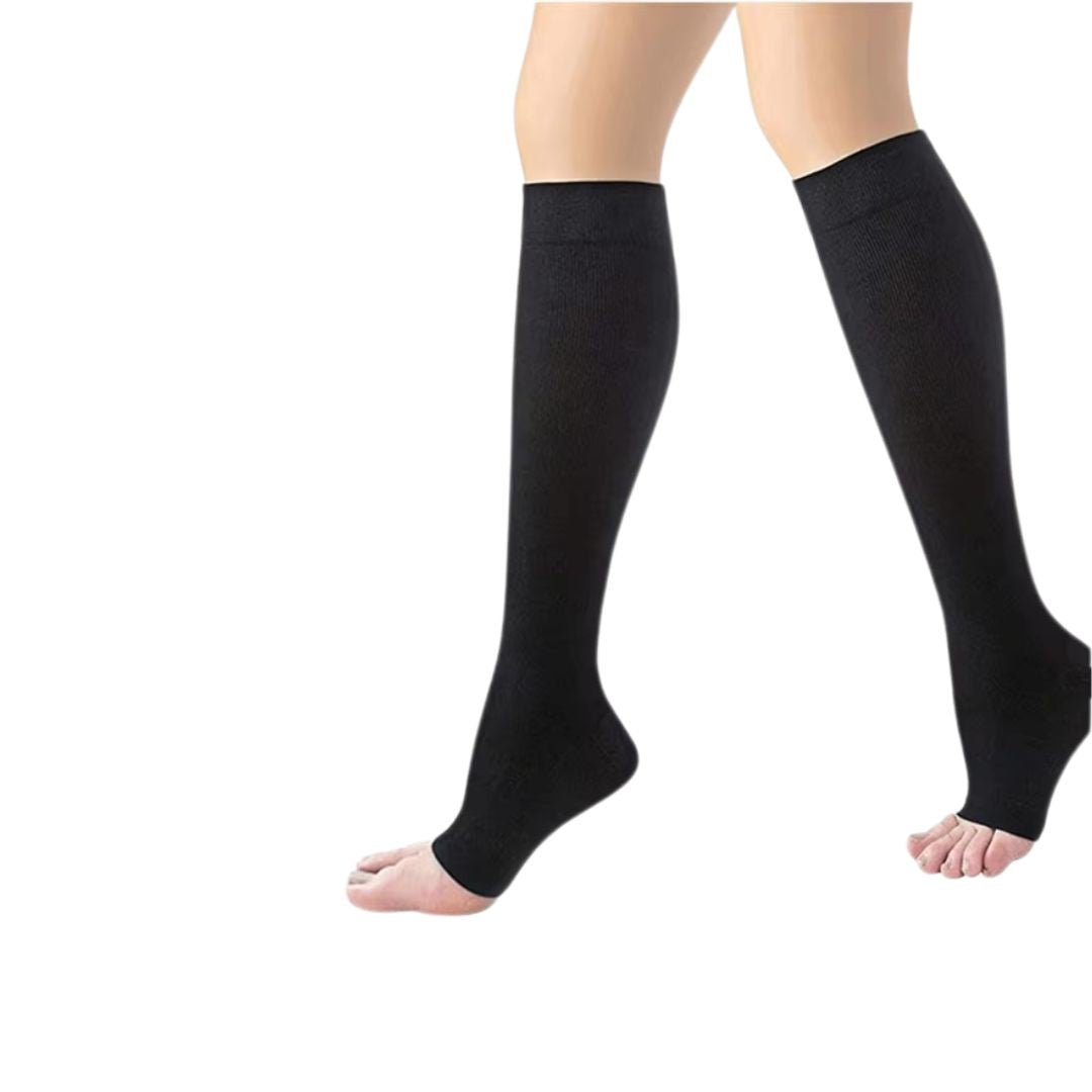 Knee-high compression stockings in nude and black, ending just below the knee