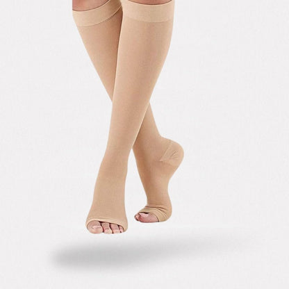 Knee-high compression stockings in nude and black, ending just below the knee