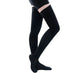 Black compression stockings reaching up the thigh with a sheer knit