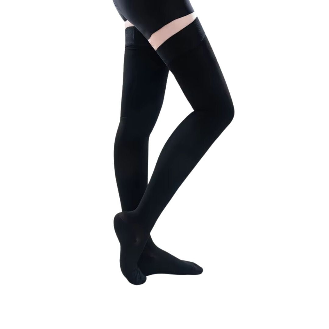 Black compression stockings reaching up the thigh with a sheer knit