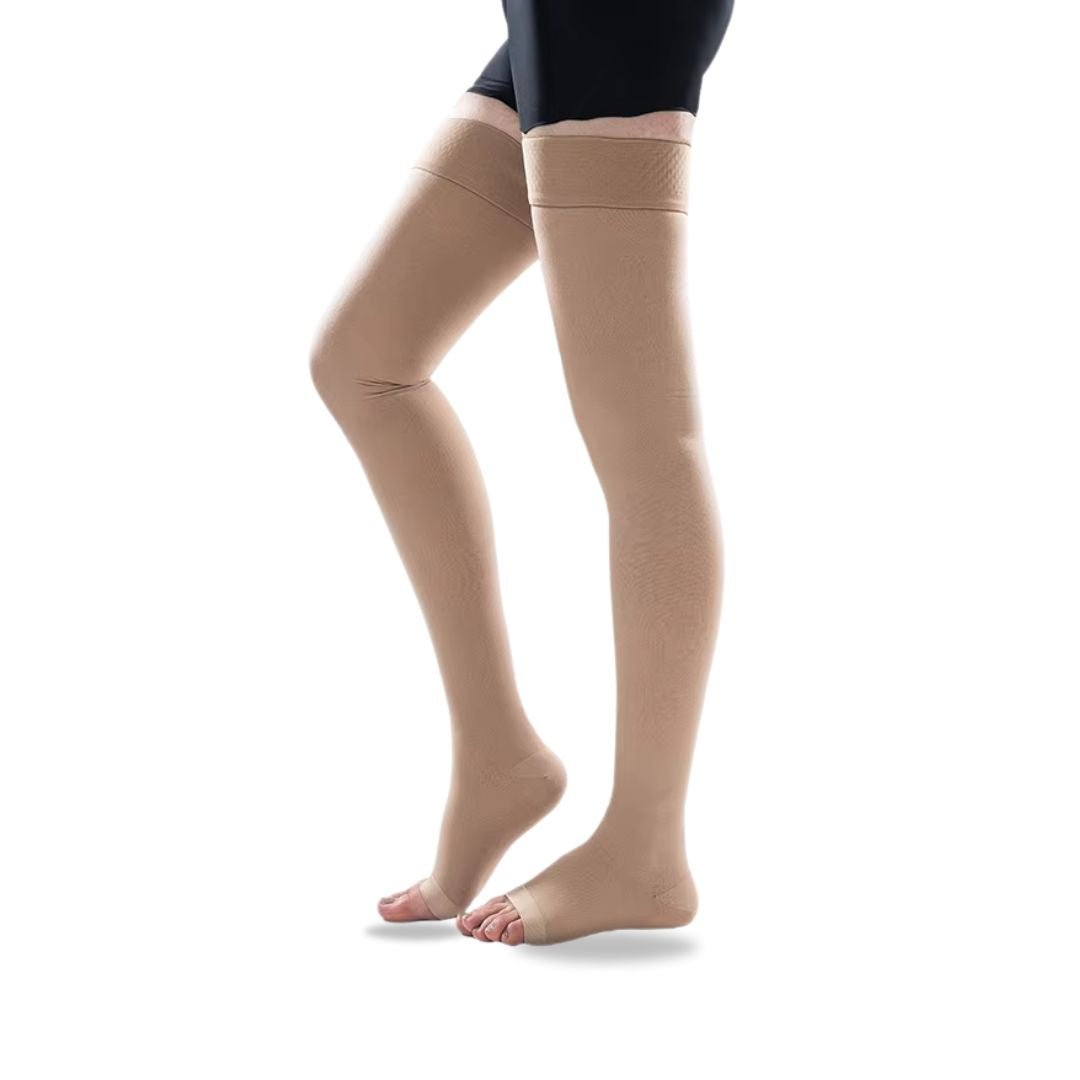 Black compression stockings reaching up the thigh with a sheer knit