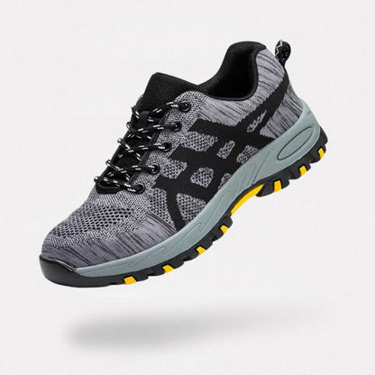 Men's orthopedic work shoes in gray and black with a deep-tread outdoor grip sole