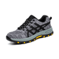 Men's orthopedic work shoes in gray and black with a deep-tread outdoor grip sole