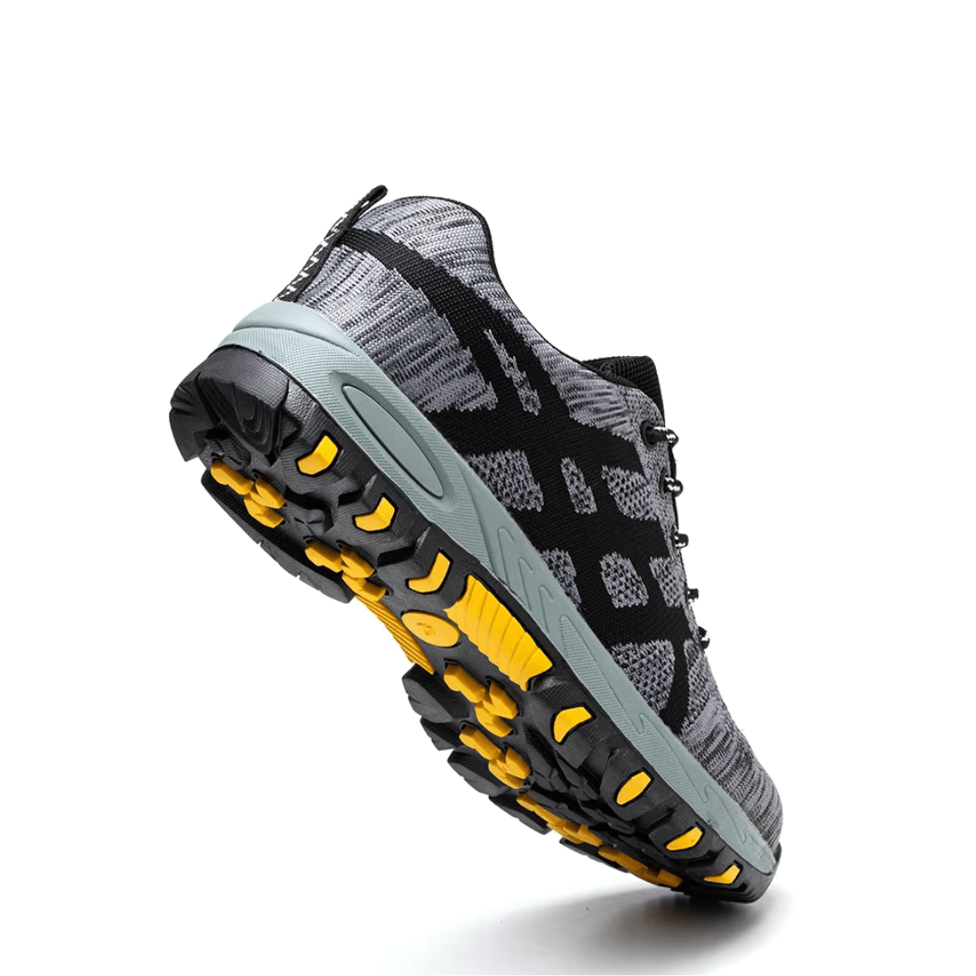Men's orthopedic work shoes in gray and black with a deep-tread outdoor grip sole