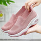 Pink orthopedic sneakers with a soft knit upper and cushioned arch support