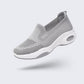 Pink orthopedic sneakers with a soft knit upper and cushioned arch support