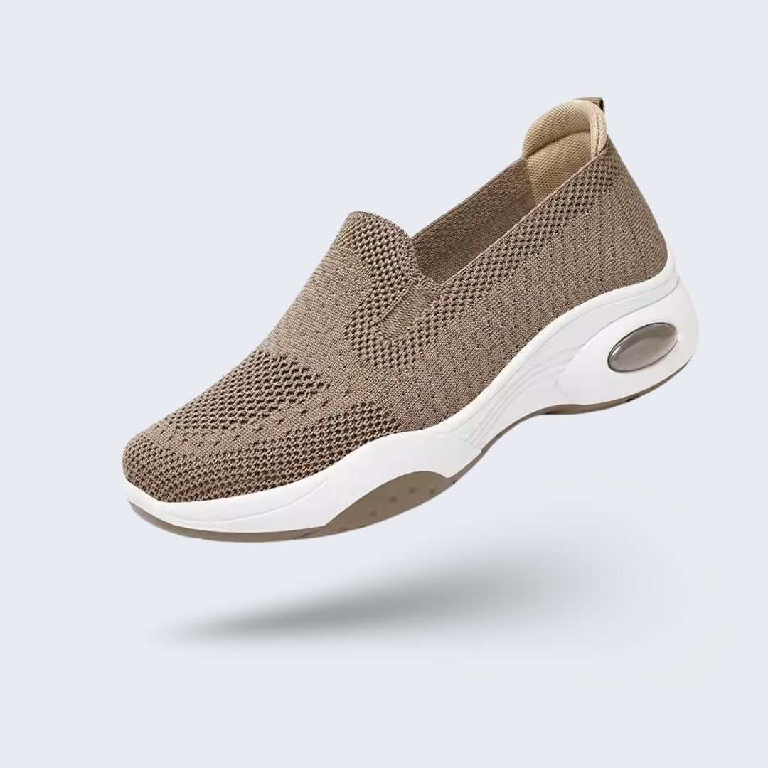Pink orthopedic sneakers with a soft knit upper and cushioned arch support