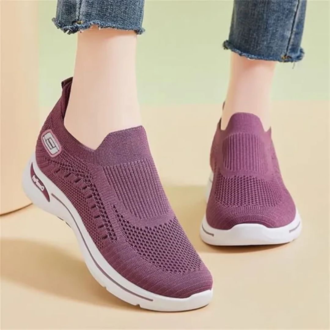 Women's orthopedic sneakers with a cushioned sole and knit upper, in pink, black, dark gray or purple