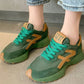 Women's orthopedic sneakers in beige, black and green with a cushioned sole