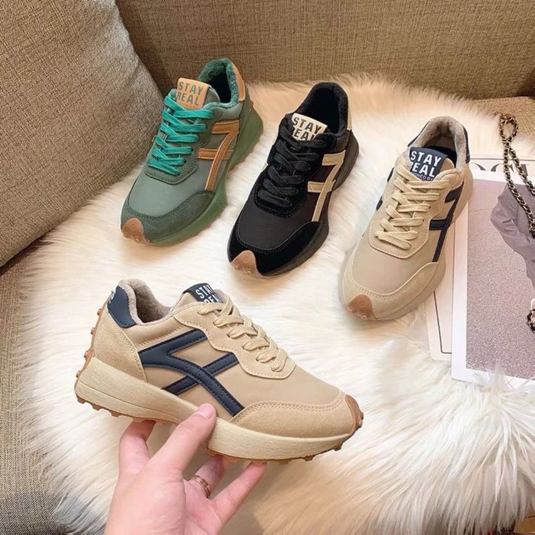Women's orthopedic sneakers in beige, black and green with a cushioned sole