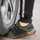 Gray breathable mesh safety sneakers with a protective toe and lace-up front
