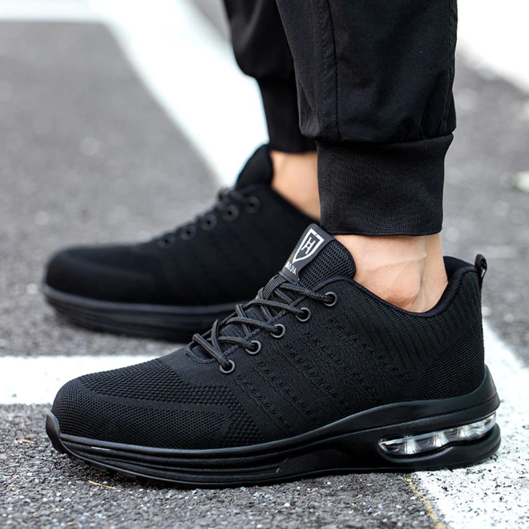 Orthopedic safety sneakers with a reinforced toe cap and a lightweight cushioned sole