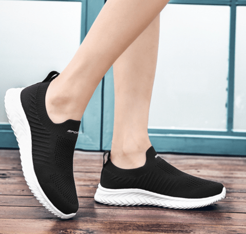 Women's orthopedic sneakers with a lace-up upper and a thick cushioned midsole