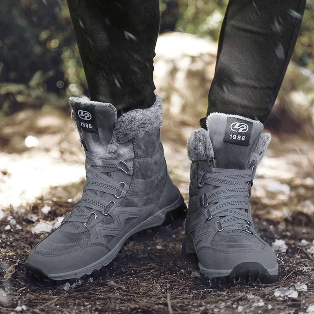 Burgundy waterproof snow boots with a fleece lining and a grippy treaded sole