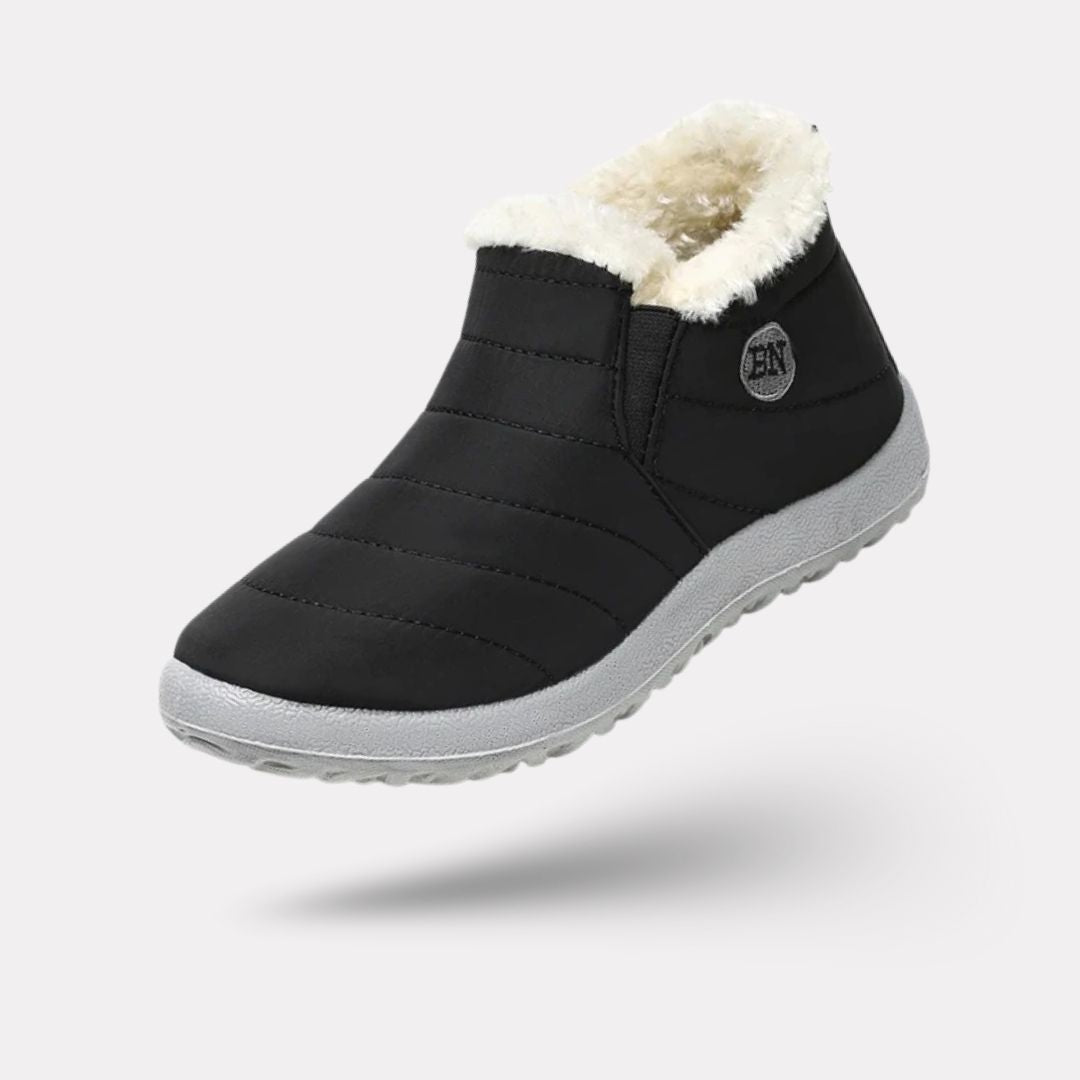 Lined waterproof boots for extreme cold in black, red, blue and green with deep-tread soles