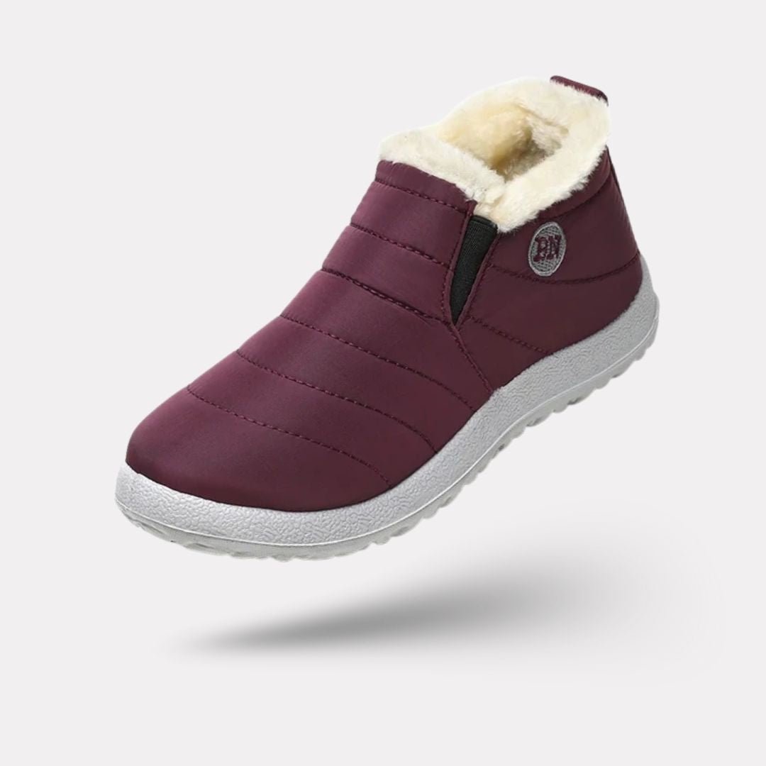Lined waterproof boots for extreme cold in black, red, blue and green with deep-tread soles
