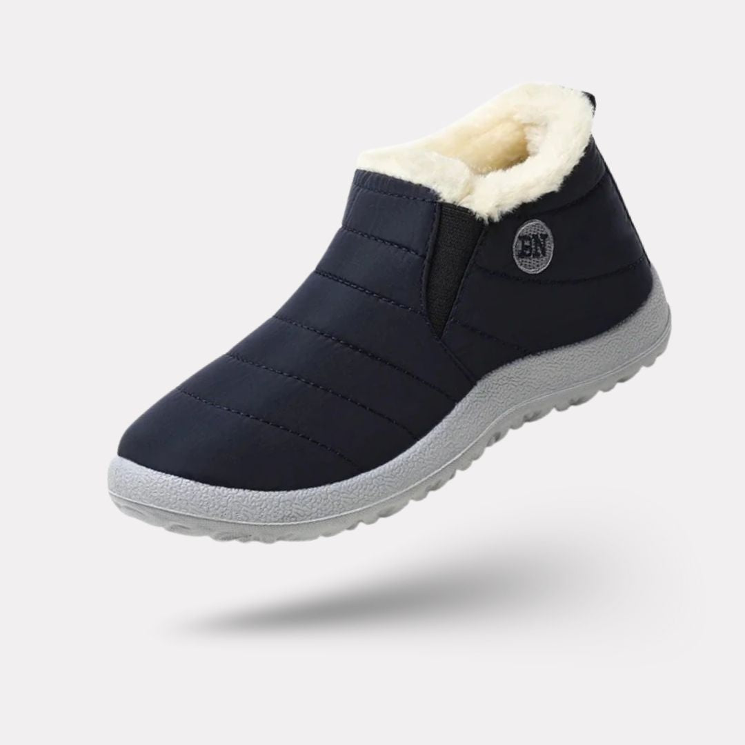 Lined waterproof boots for extreme cold in black, red, blue and green with deep-tread soles