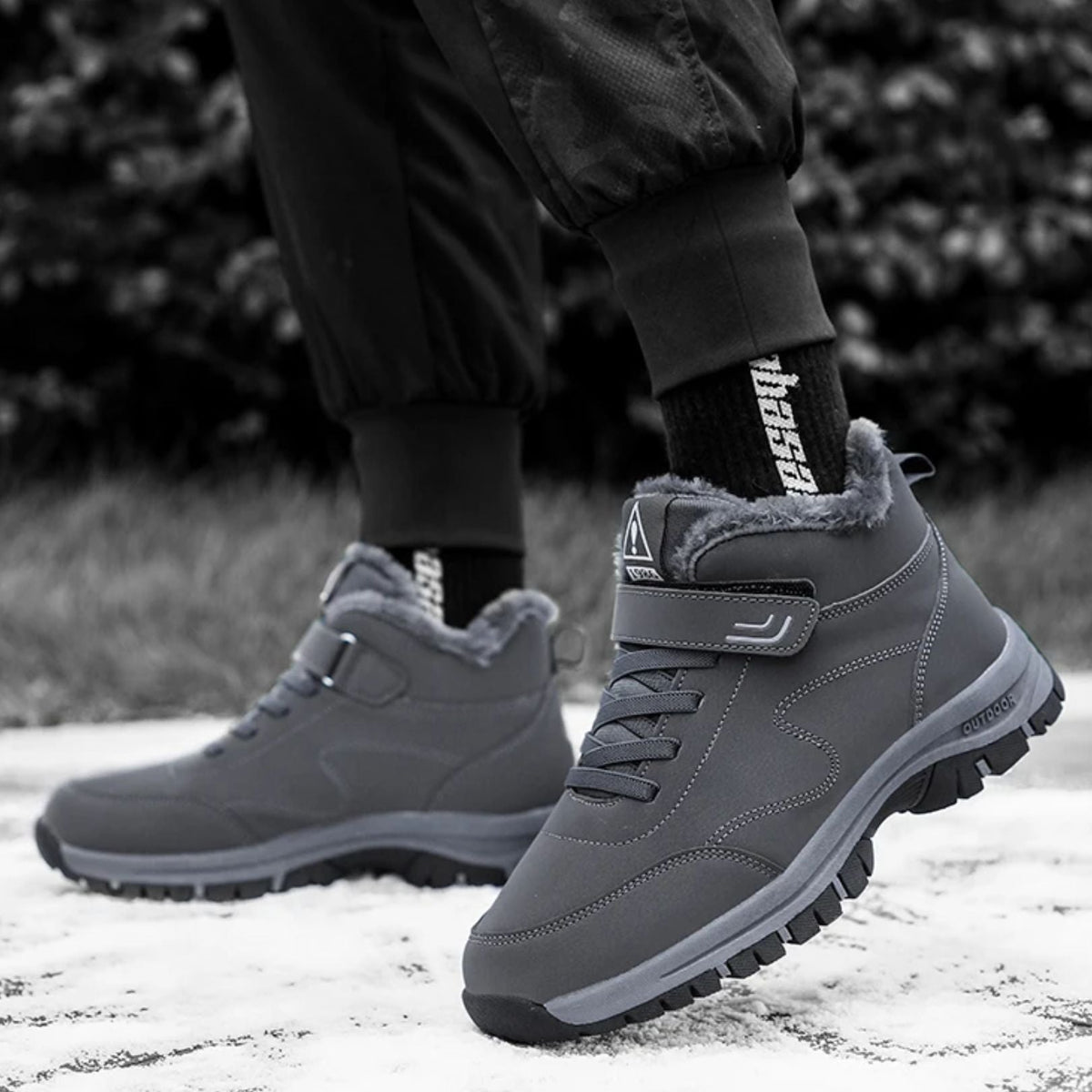 Lined waterproof winter boots in red, black and gray with a thick treaded sole