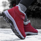 Lined waterproof winter boots in red, black and gray with a thick treaded sole