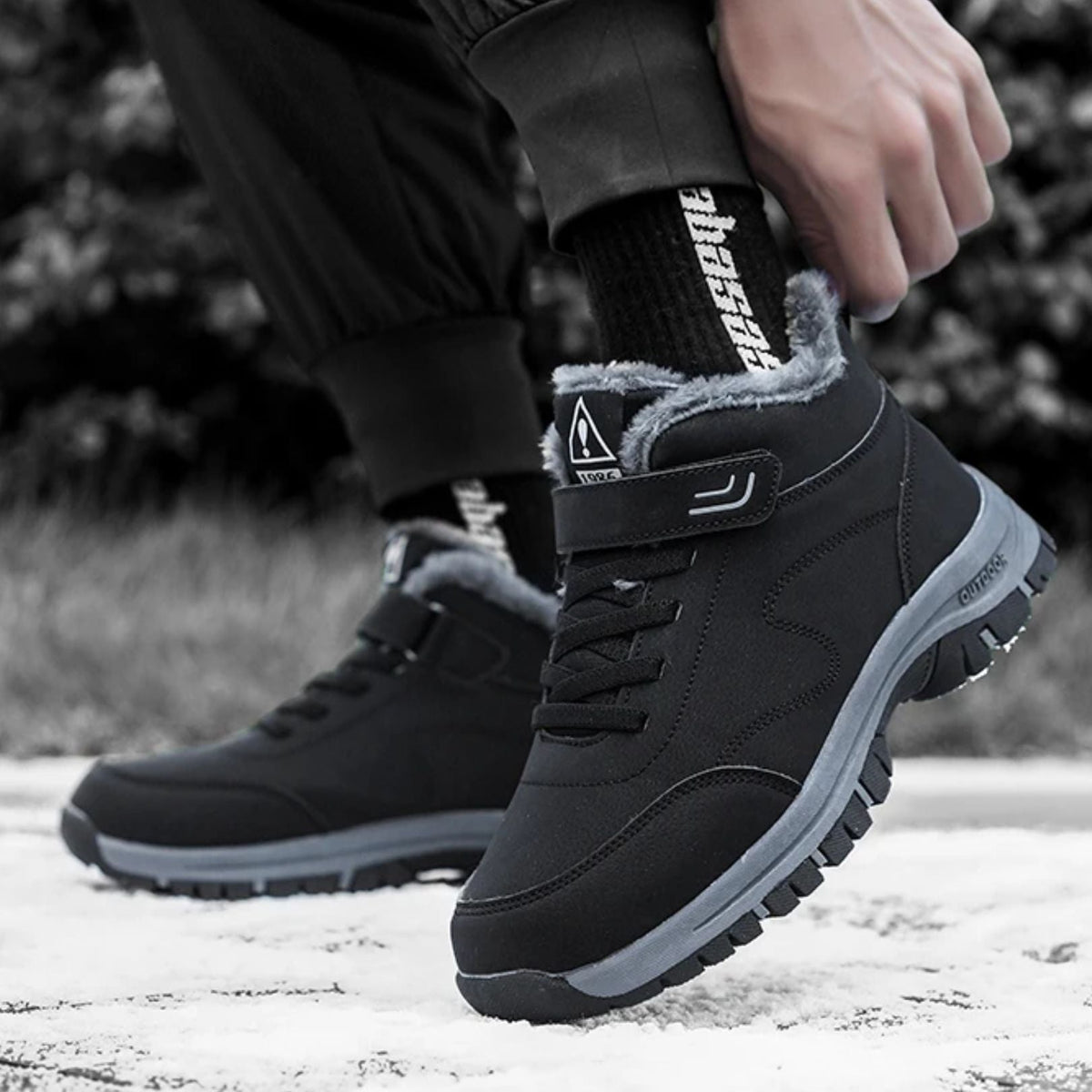 Lined waterproof winter boots in red, black and gray with a thick treaded sole