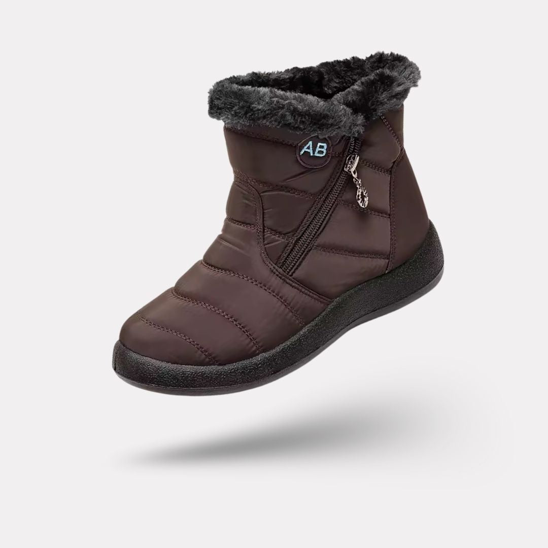Women's waterproof winter boots in red, black, navy, gray and caramel with lugged soles