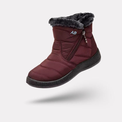 Women's waterproof winter boots in red, black, navy, gray and caramel with lugged soles