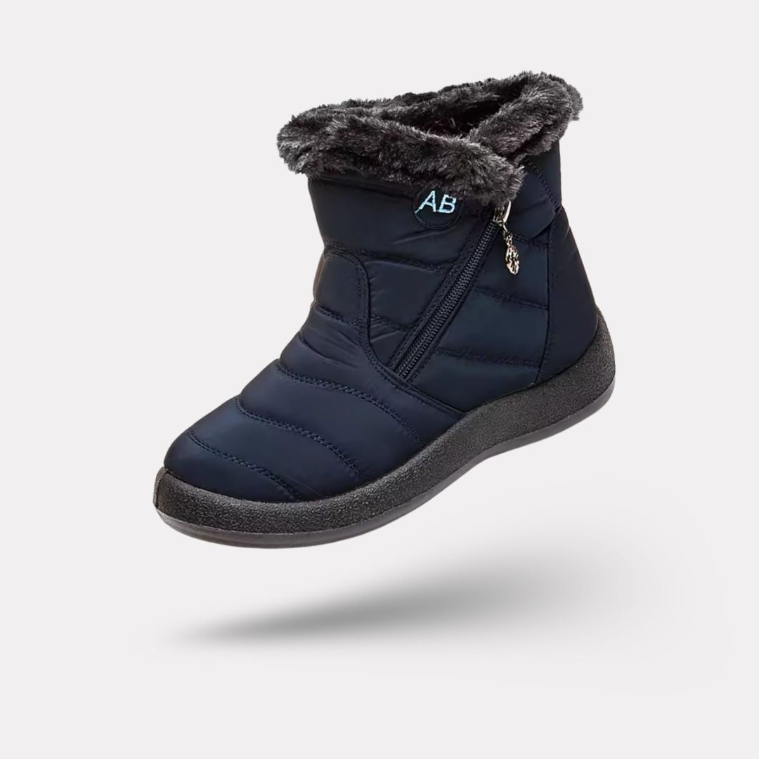Women's waterproof winter boots in red, black, navy, gray and caramel with lugged soles
