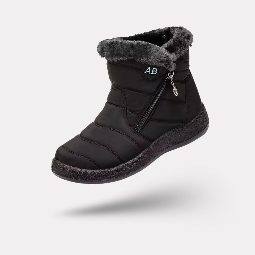 Women's waterproof winter boots in red, black, navy, gray and caramel with lugged soles