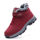 Black fleece lined orthopedic boots reaching just above the ankle