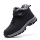 Black fleece lined orthopedic boots reaching just above the ankle