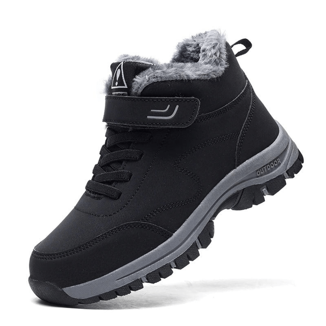 Black fleece lined orthopedic boots reaching just above the ankle