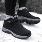 Black fleece lined orthopedic boots reaching just above the ankle