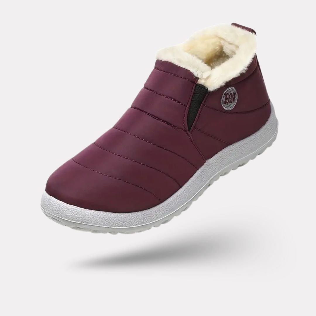 Fleece-lined waterproof winter boots for women in green, red, black and blue with non-slip soles