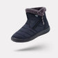 Navy waterproof snow boots for women, lined and reaching mid calf