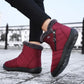Navy waterproof snow boots for women, lined and reaching mid calf