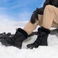 Waterproof winter boots in black and caramel with a lugged non-slip sole