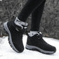 Black fleece lined orthopedic boots reaching just above the ankle