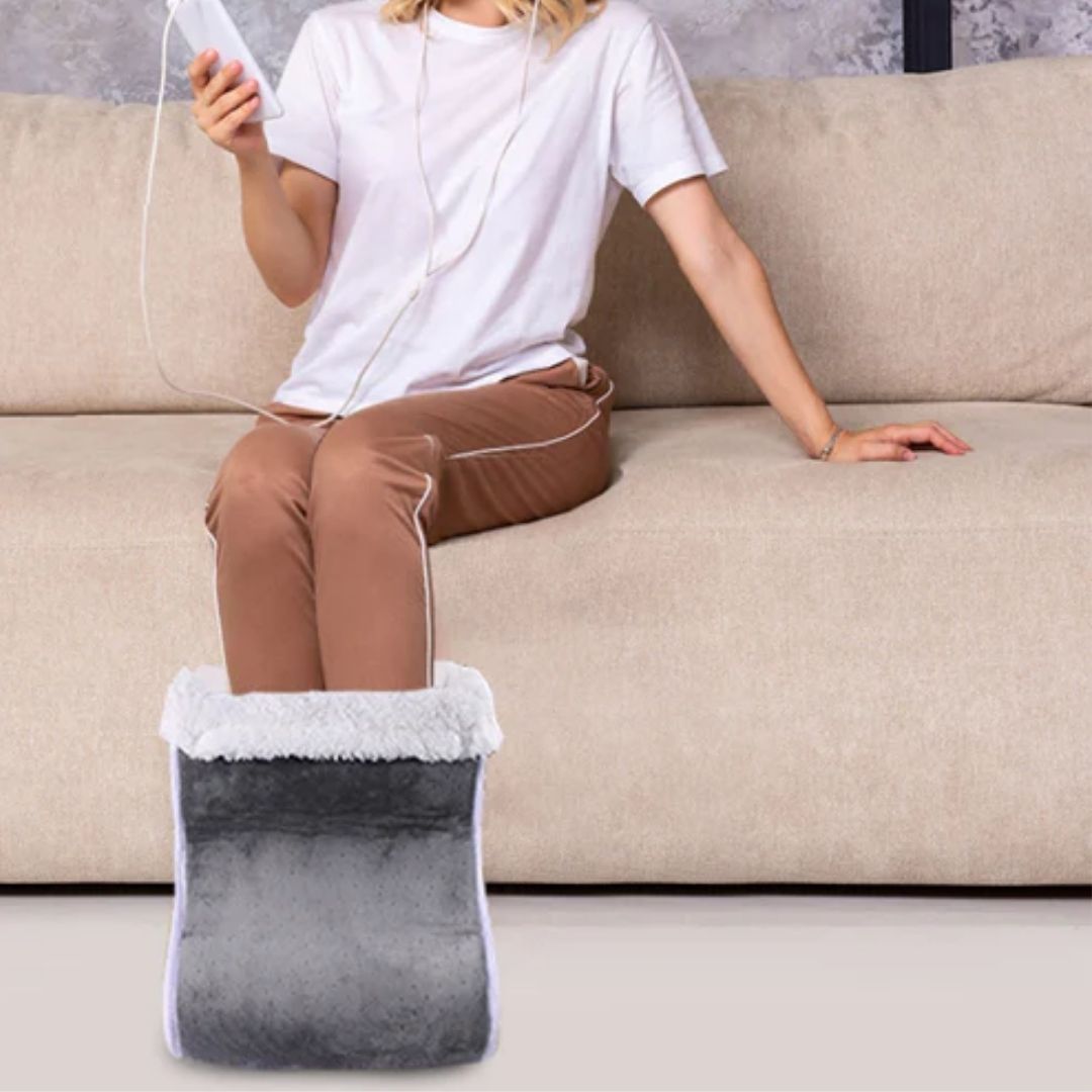 Electric foot warmer with a lined inner pocket that both feet slide into