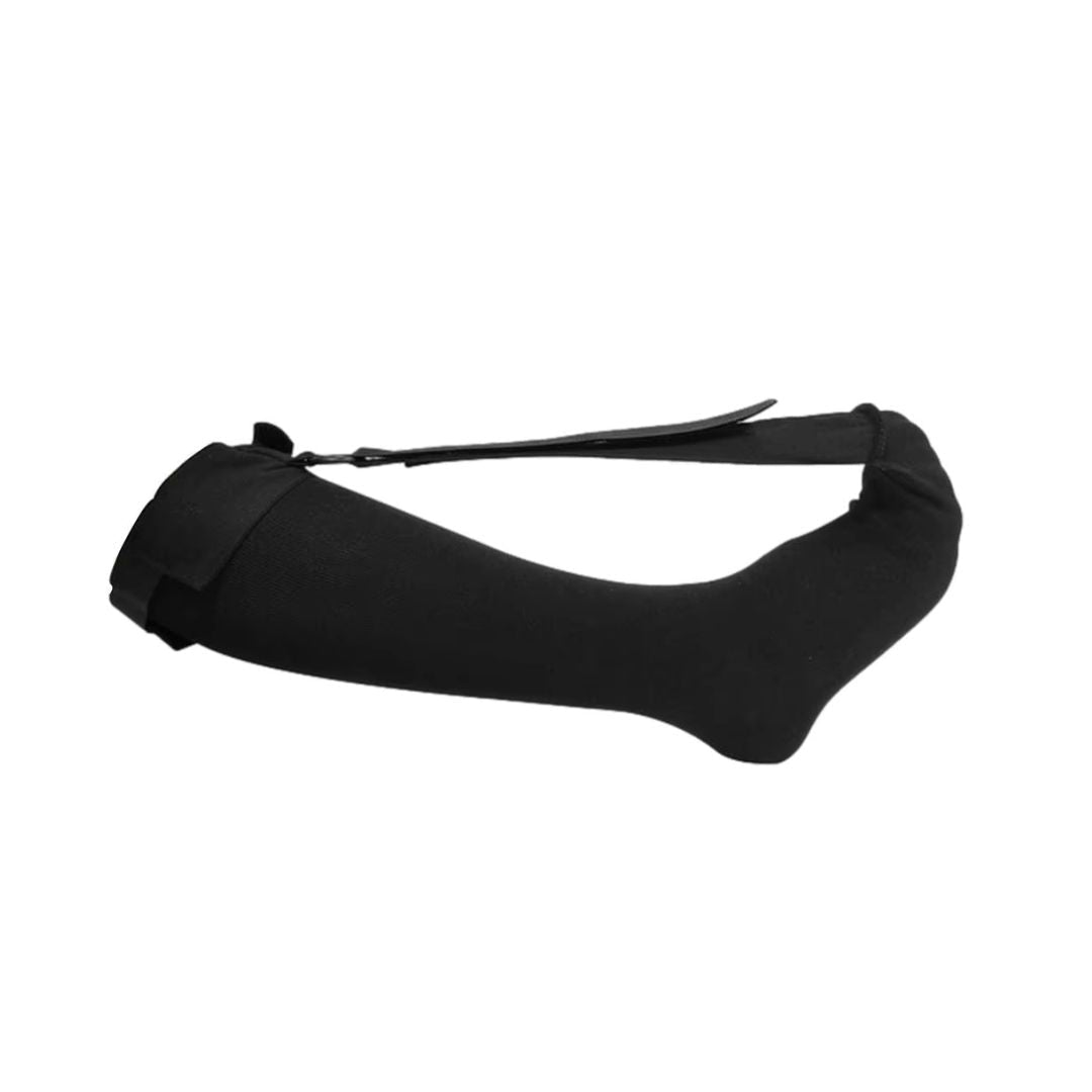 Black night socks worn over the foot and ankle to stretch the plantar arch