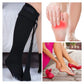 Black night socks worn over the foot and ankle to stretch the plantar arch