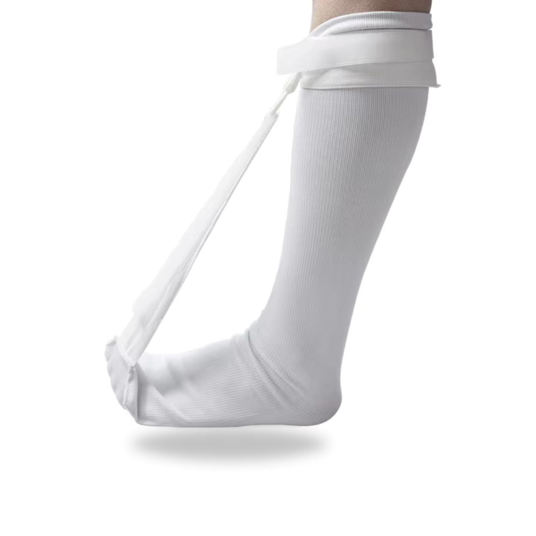 Black night socks worn over the foot and ankle to stretch the plantar arch