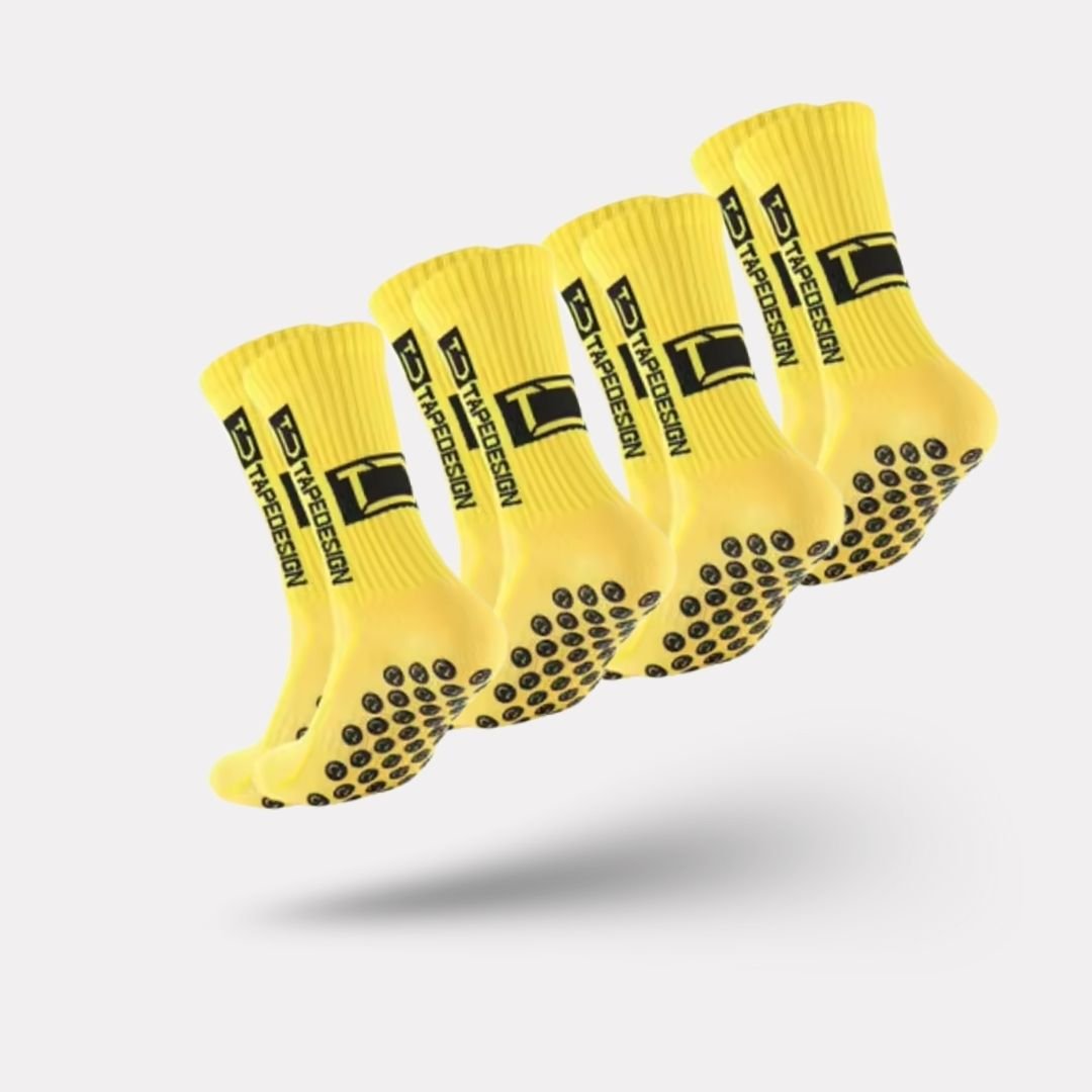 Set of white non-slip socks with rubber grip dots printed on the sole