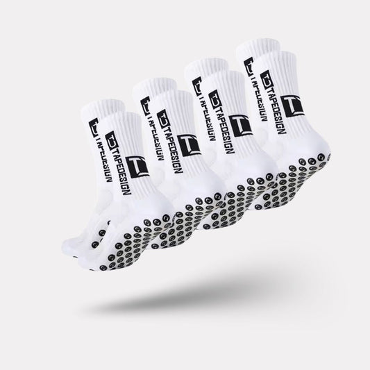 Set of white non-slip socks with rubber grip dots printed on the sole