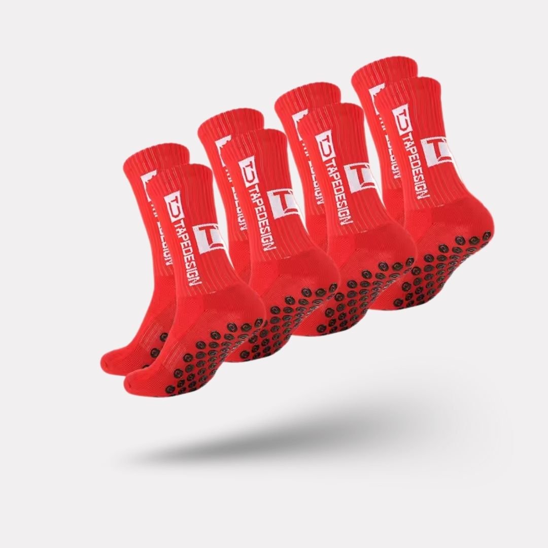 Set of white non-slip socks with rubber grip dots printed on the sole