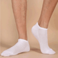 Low-cut odor-control socks in black and white, cut to sit just below the ankle bone