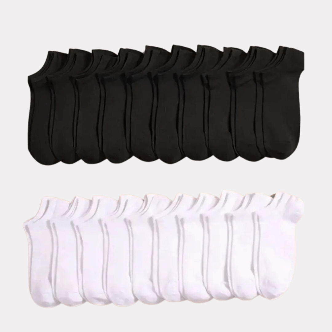 Low-cut odor-control socks in black and white, cut to sit just below the ankle bone