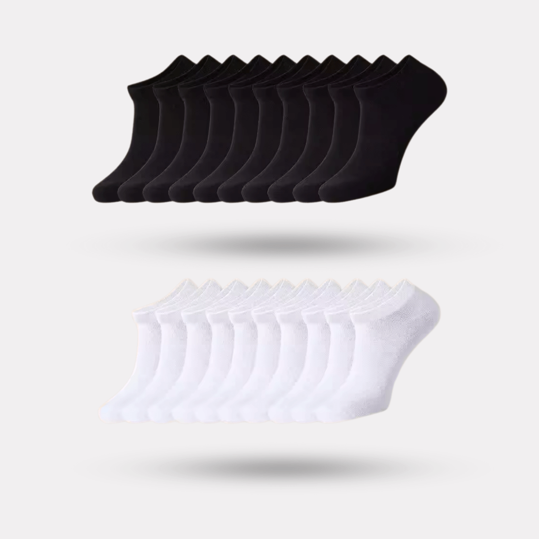 Low-cut odor-control socks in black and white, cut to sit just below the ankle bone